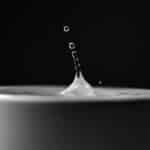 drop of water in black and white photo