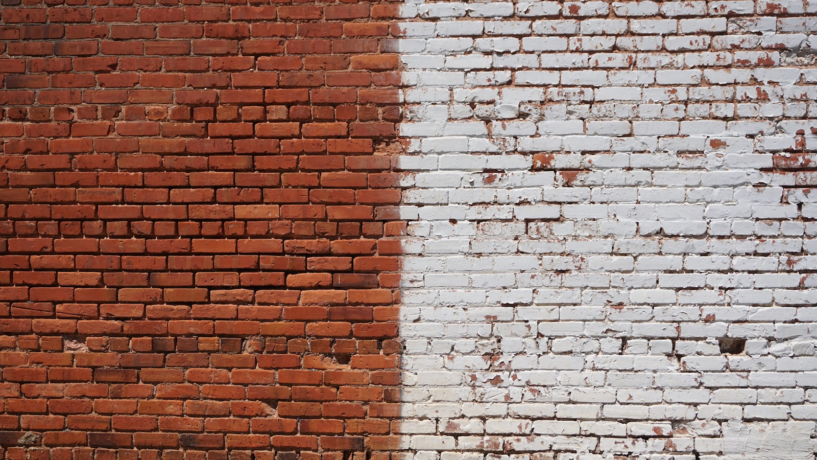 photo of white and brown bricked wall during daytime
